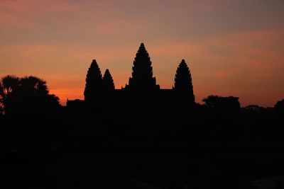 Silhouette of temple at sunset