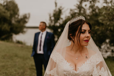 Portrait of bride holding bouquet