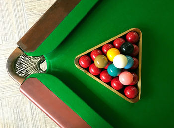 High angle view of colorful balls on pool table