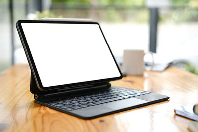 Close-up of laptop on table