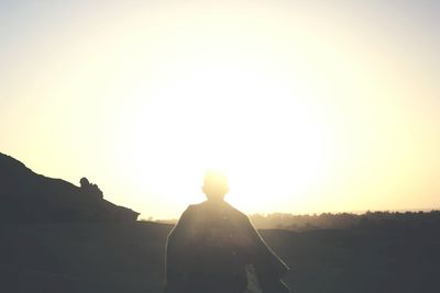 Silhouette of man against sky