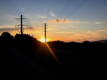 Electricity pylon at sunset