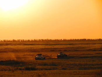 Scenic view of landscape at sunset