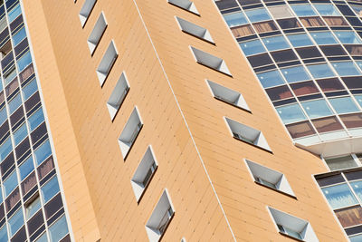 Low angle view of modern building against clear sky