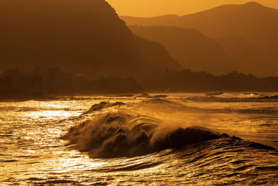 Scenic view of sea against sky during sunset