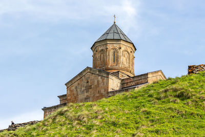 Low angle view of historic building against sky