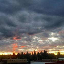 Scenic view of dramatic sky at sunset