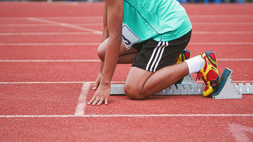 Midsection of man running