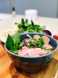 Close-up of salad in bowl on table