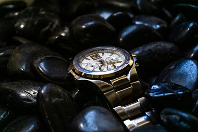 Close-up of clock on table