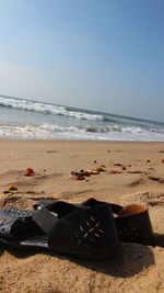 Scenic view of beach against clear sky