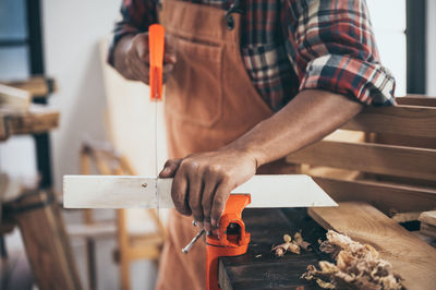 Man working on wood