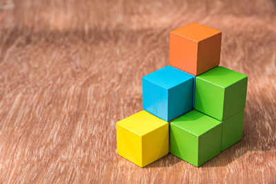 High angle view of multi colored toy blocks on table