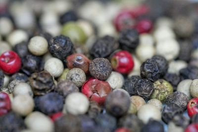 Full frame shot of peppercorns on table