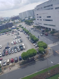 High angle view of cars on street in city