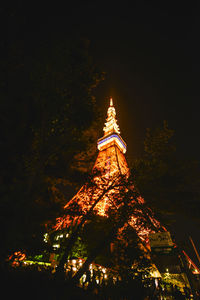 Low angle view of lit up at night