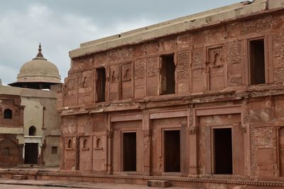 Low angle view of historical building against sky