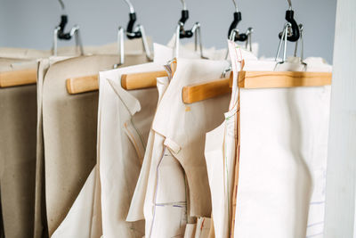 Close-up of clothes hanging on rack