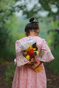 Portrait of woman with flowers
