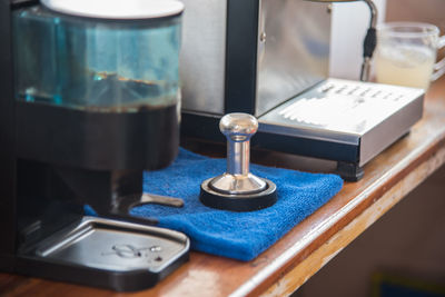 Close-up of equipment on table