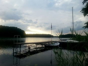 Scenic view of lake at sunset