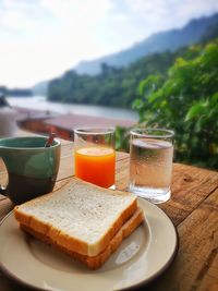 Bread, coffee, orange juice, breakfast