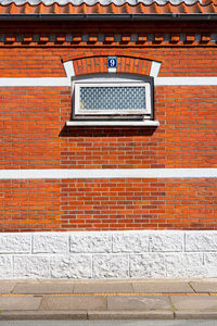 Low angle view of brick wall