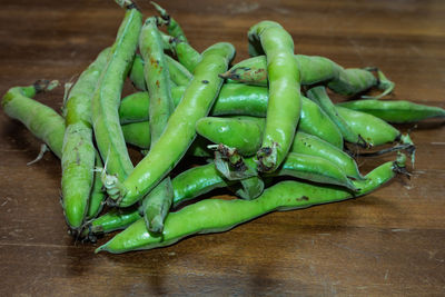 High angle view of green chili pepper on table