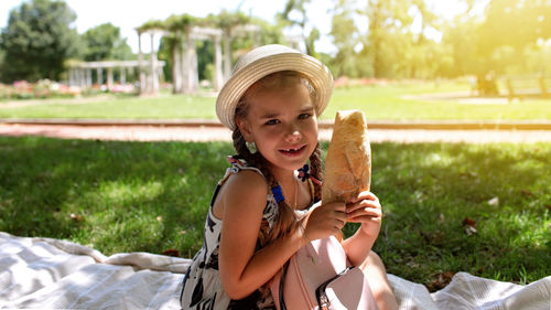 Portrait of smiling girl wearing hat