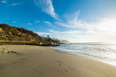 Scenic view of beach against sky