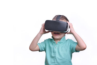 Boy wearing hat against white background