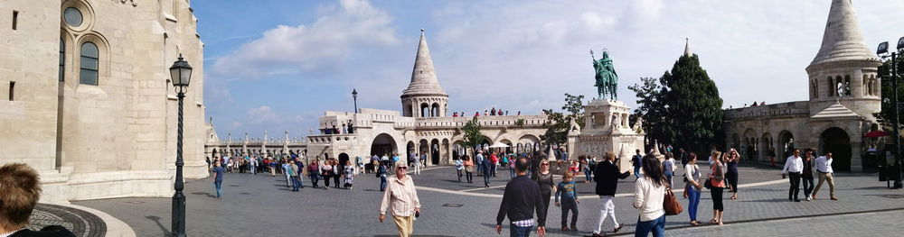 Tourists in front of historic building