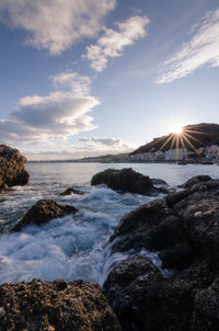 Scenic view of sea against sky during sunset