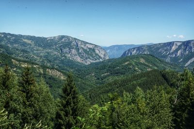 Scenic view of mountains against clear sky