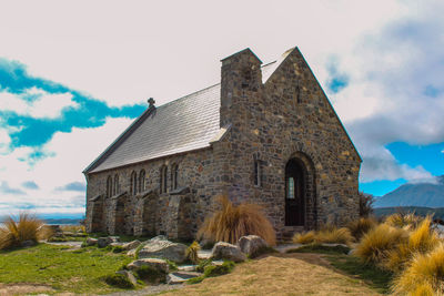 Old ruins of building against sky