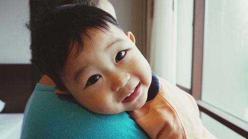 Portrait of cute baby girl at home