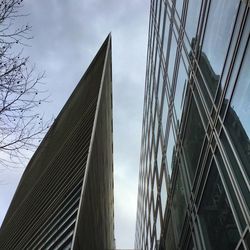 Low angle view of modern building against sky