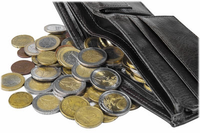 High angle view of coins on table