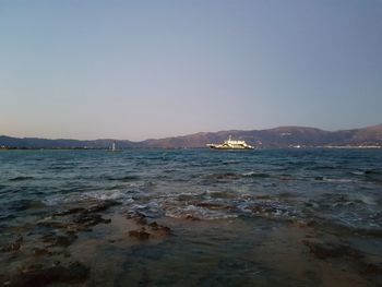 Scenic view of sea against clear sky
