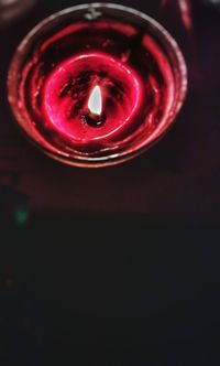 Close-up of illuminated tea light