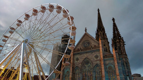 Detail of the ferris wheel in the central square of themulhouse city during the christmas holidays
