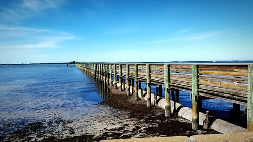 View of calm sea against blue sky