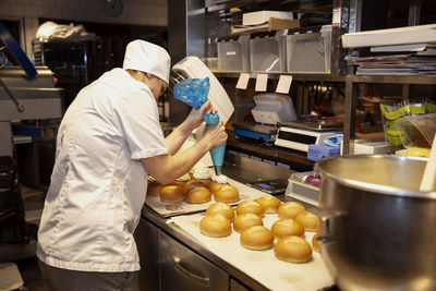 Female baker in bakery
