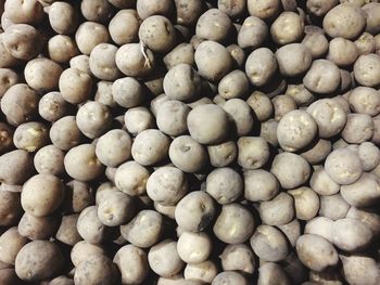 Full frame shot of potatoes for sale at market stall