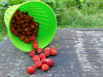 High angle view of strawberries in bowl on table