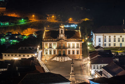 High angle view of buildings at night