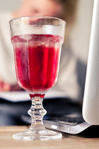 Close-up of beer glass on table