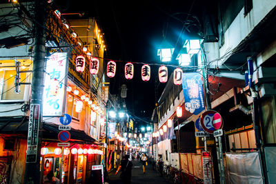Low angle view of city street at night