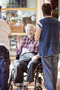 Senior man on wheelchair in care home