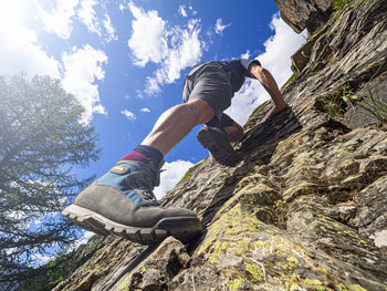 Climber on a wall in the alps